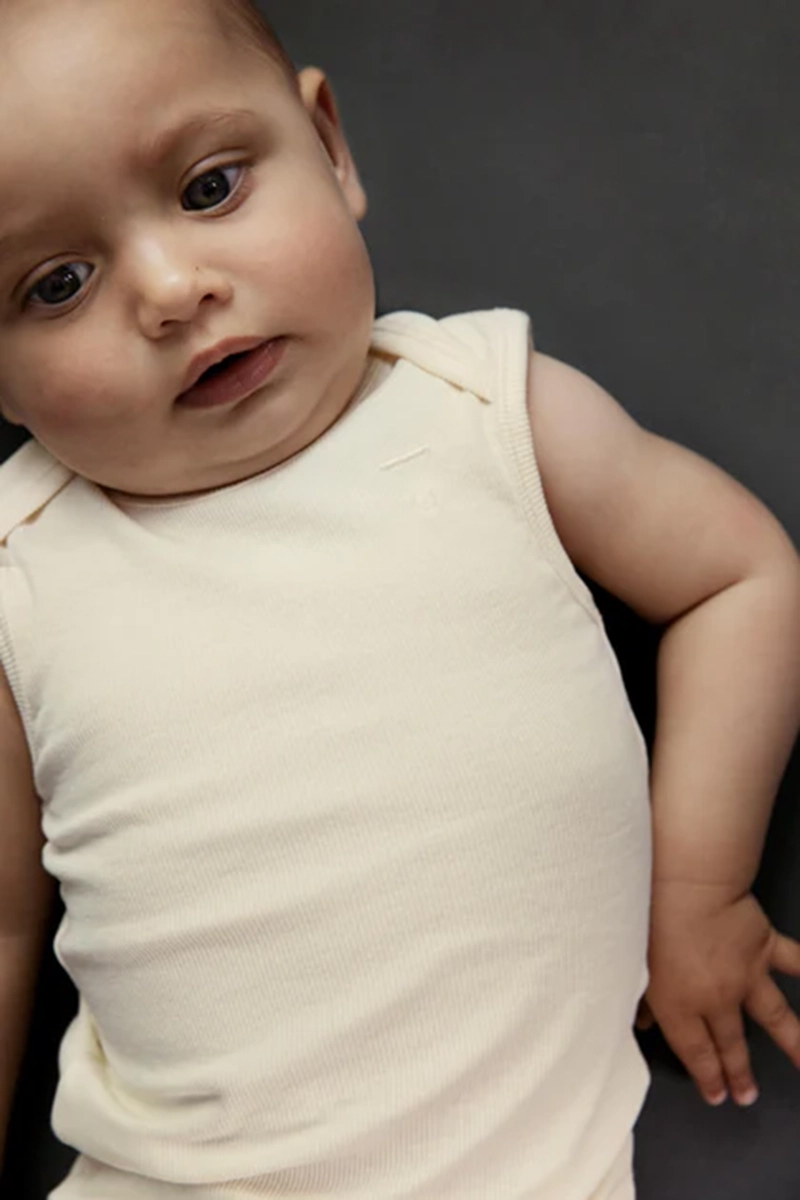 Baby romper mouwloos ecru