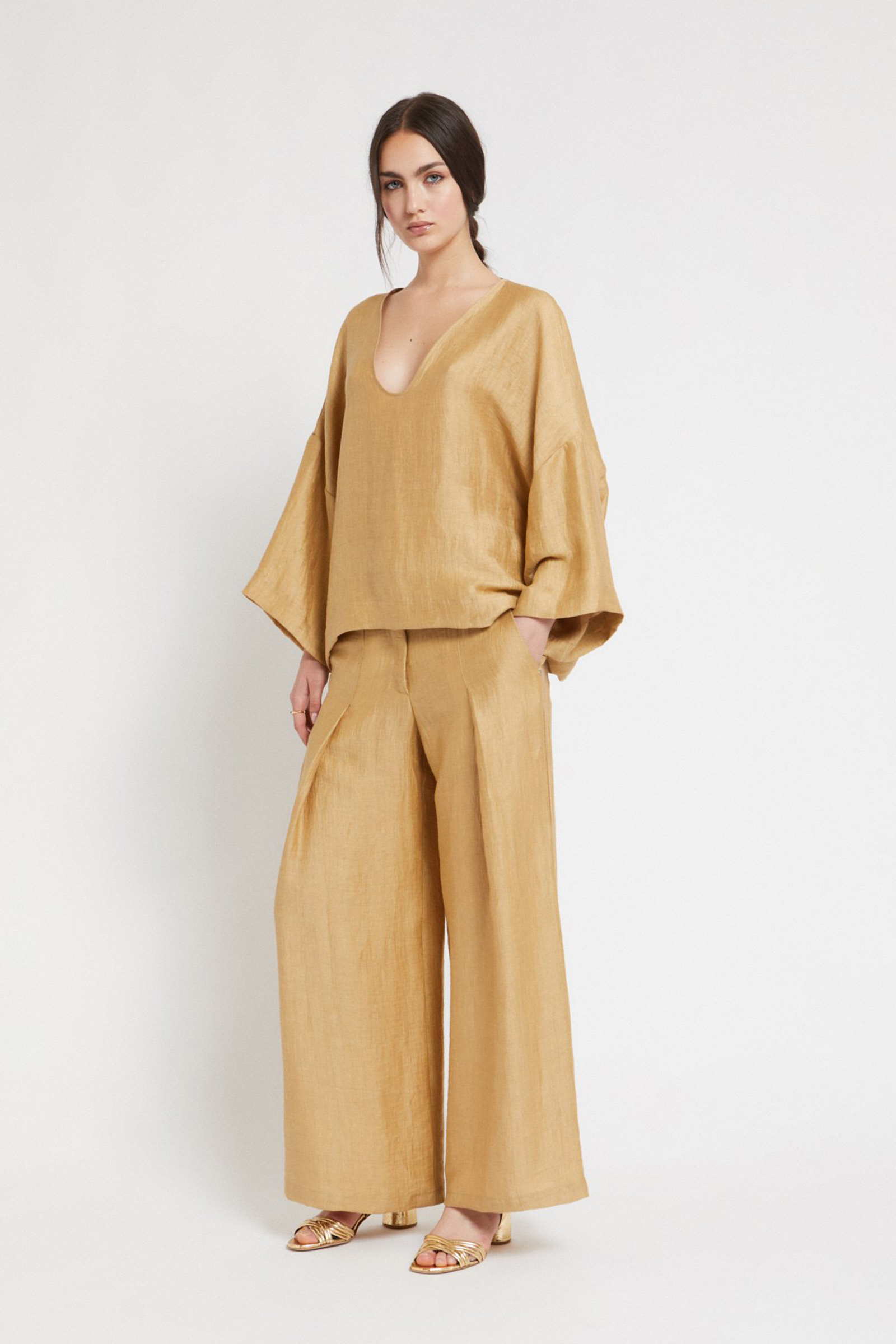 Dames blouse lange mouw goud