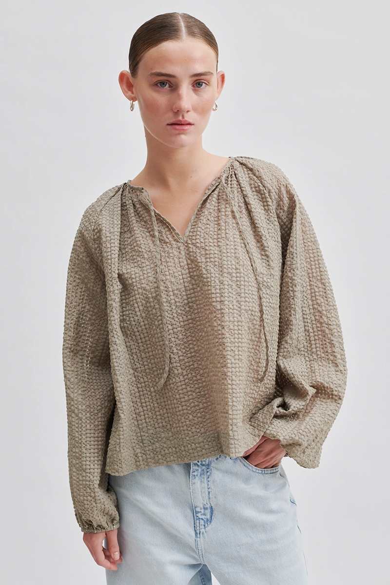Dames blouse lange mouw bruin