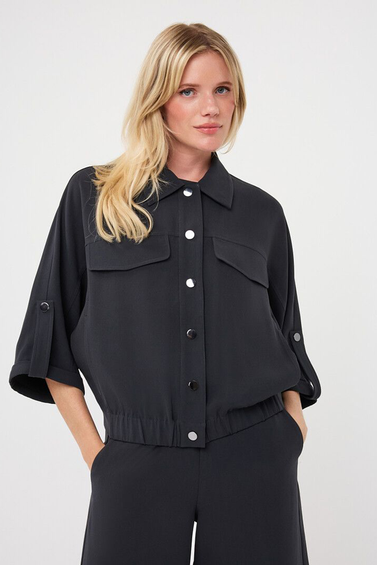 Dames blouse lange mouw grijs