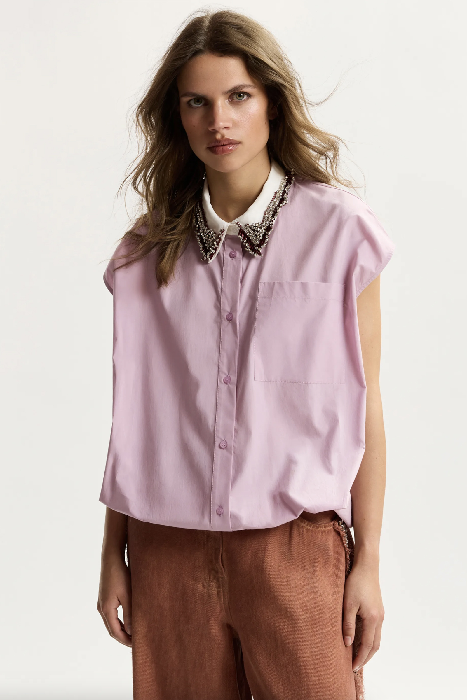 Dames blouse mouwloos paars